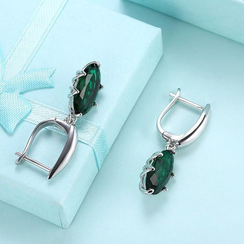 Emerald Oval Cut Earrings Set in 18K White Gold